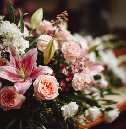 Pink lilies and roses representing cremation services in Prosper, TX.